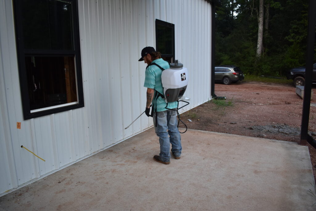 Chris providing pest control services